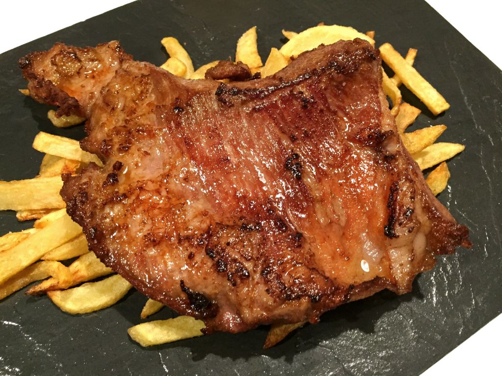 Secreto ibérico ginger macerado en salsa de jengibre