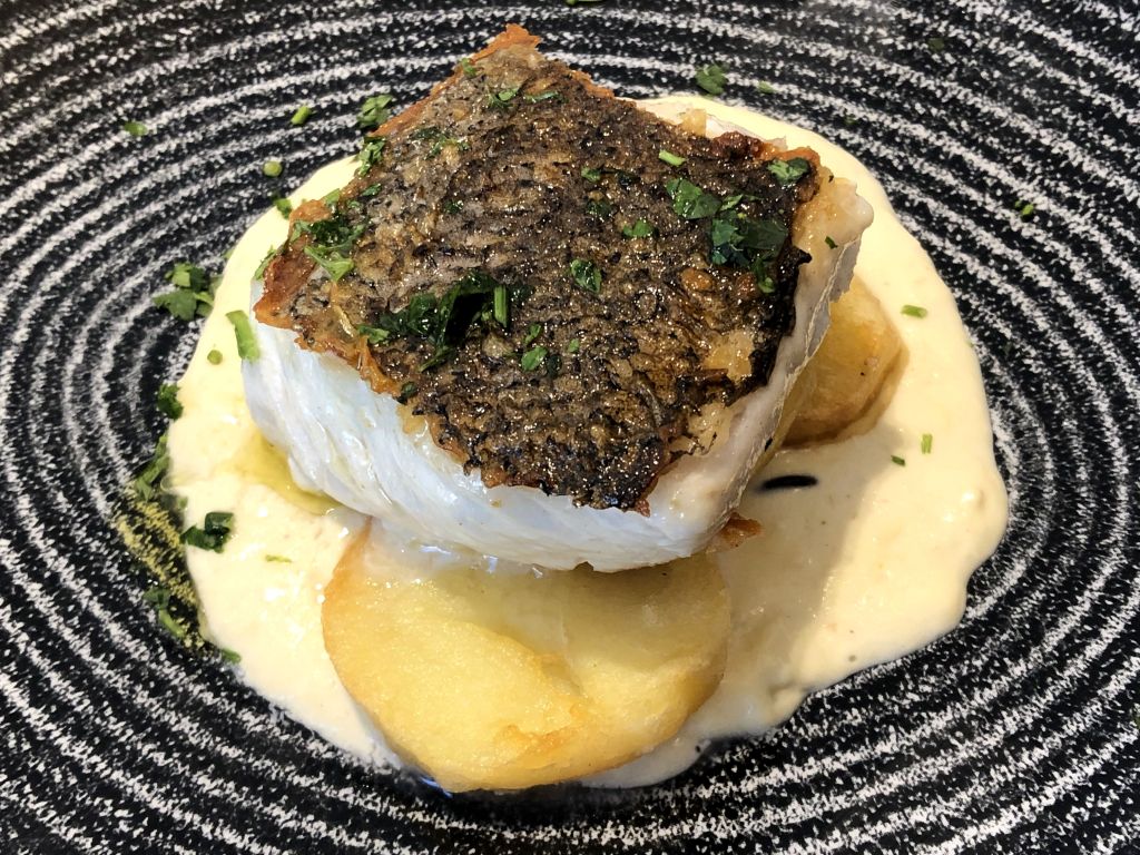 Merluza con crema de puerros