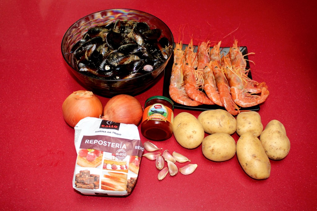 Mejillones y Gambones en Salsa de Ají Panca 
