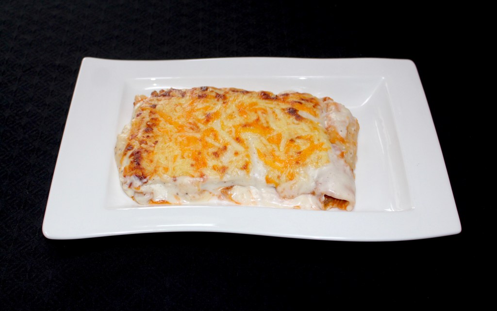 Canelones de Manitas de Cerdo