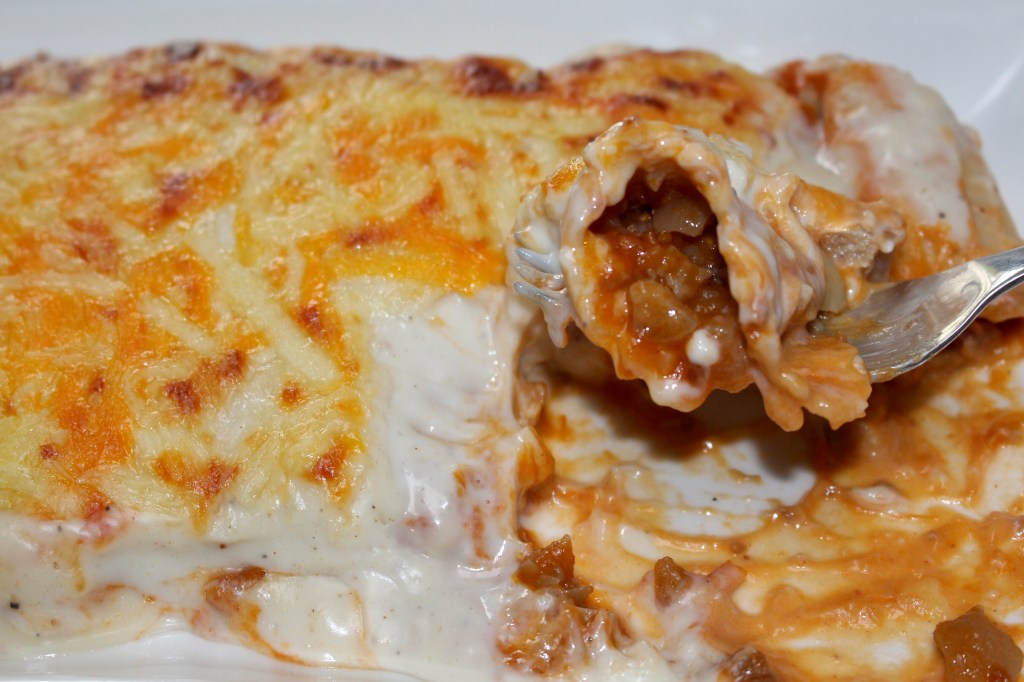 Canelones de Manitas de Cerdo